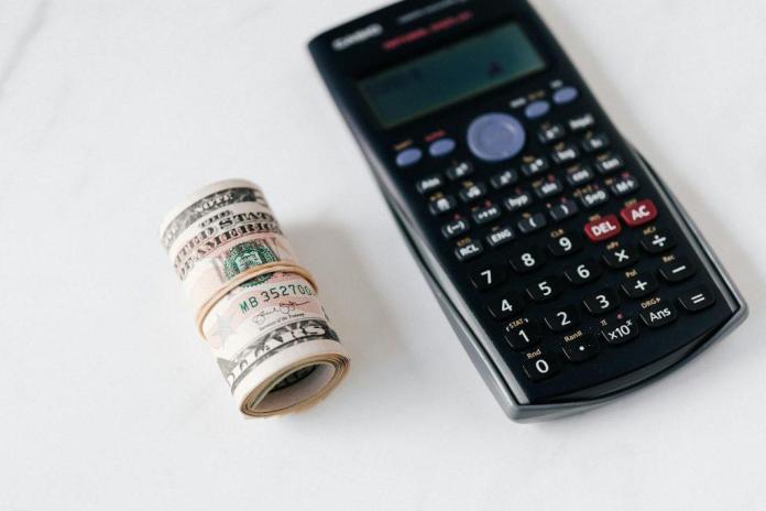 A digital compound interest calculator showing potential savings growth over time.
